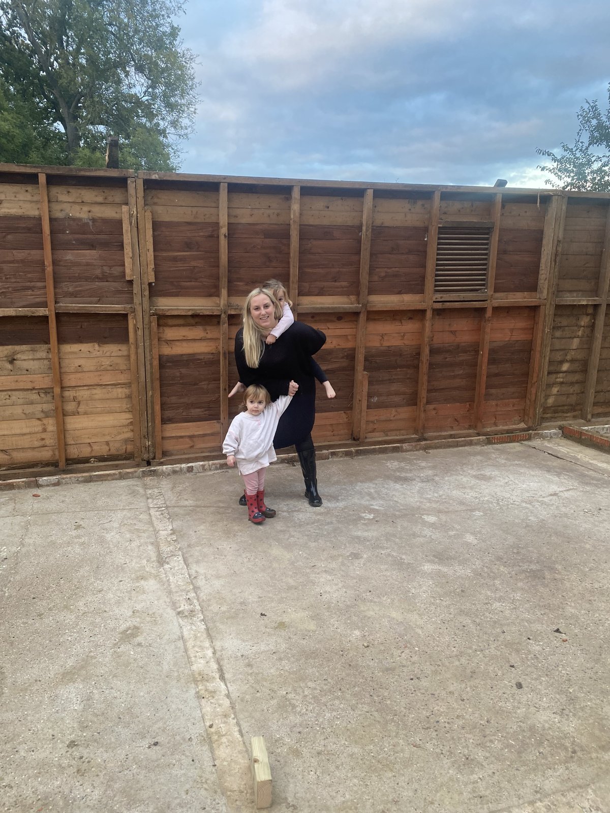 Kat and her daughters at the new property